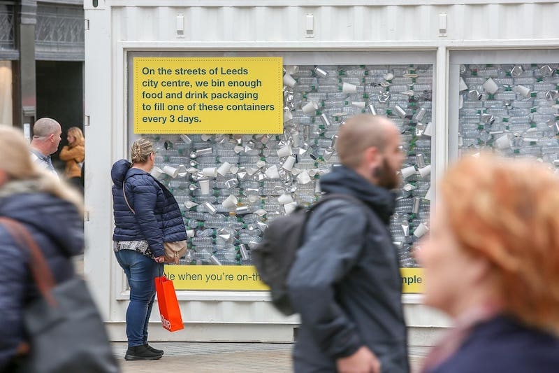 Photo of an exhibition showing how much food and drink packaging we waste in Leeds every three days
