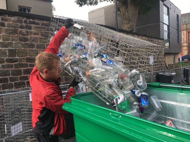 Rob from Zero Waste Leeds emptying a recycling bin at a recent event